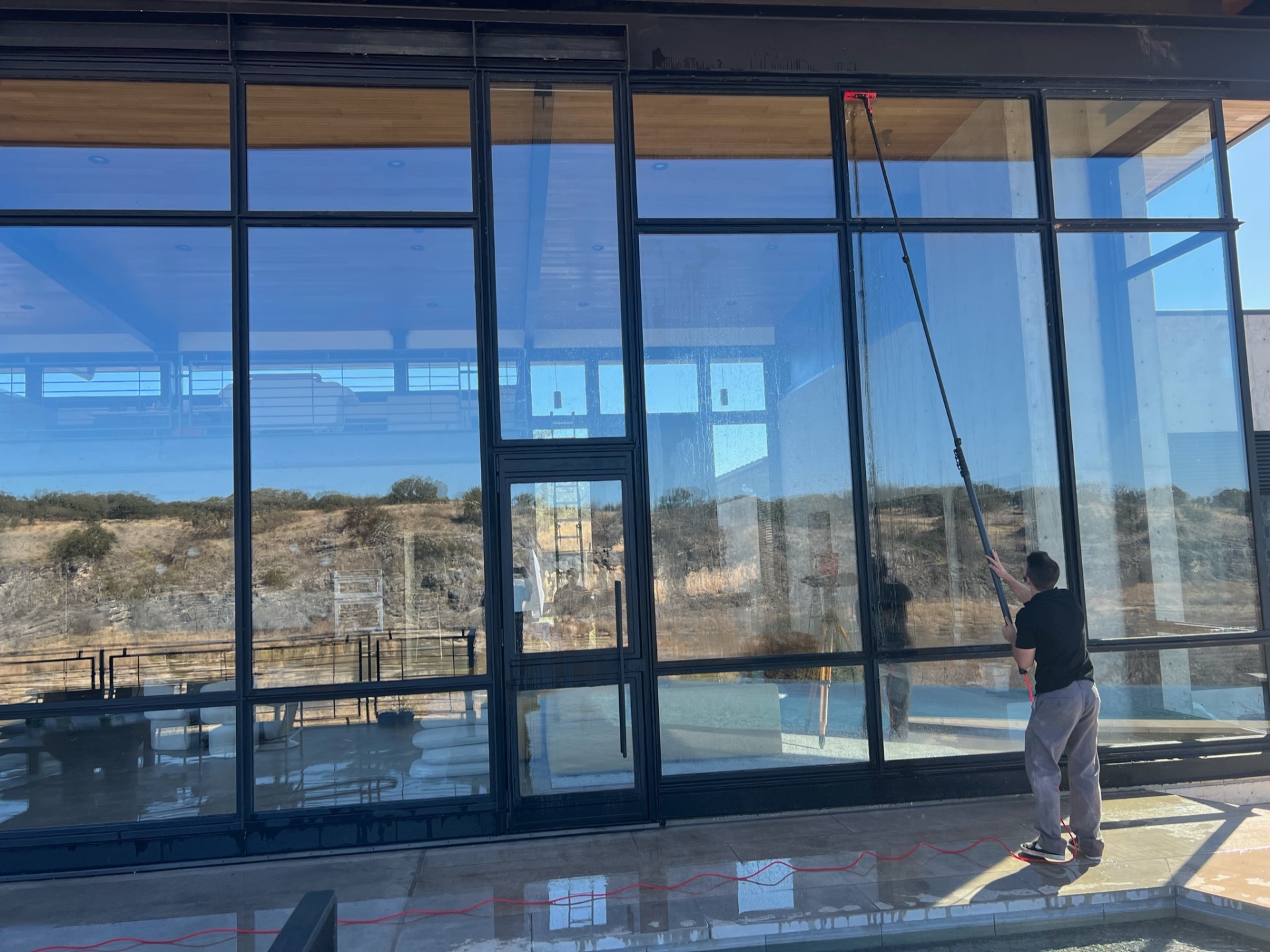 Residential window cleaning with water-fed pole