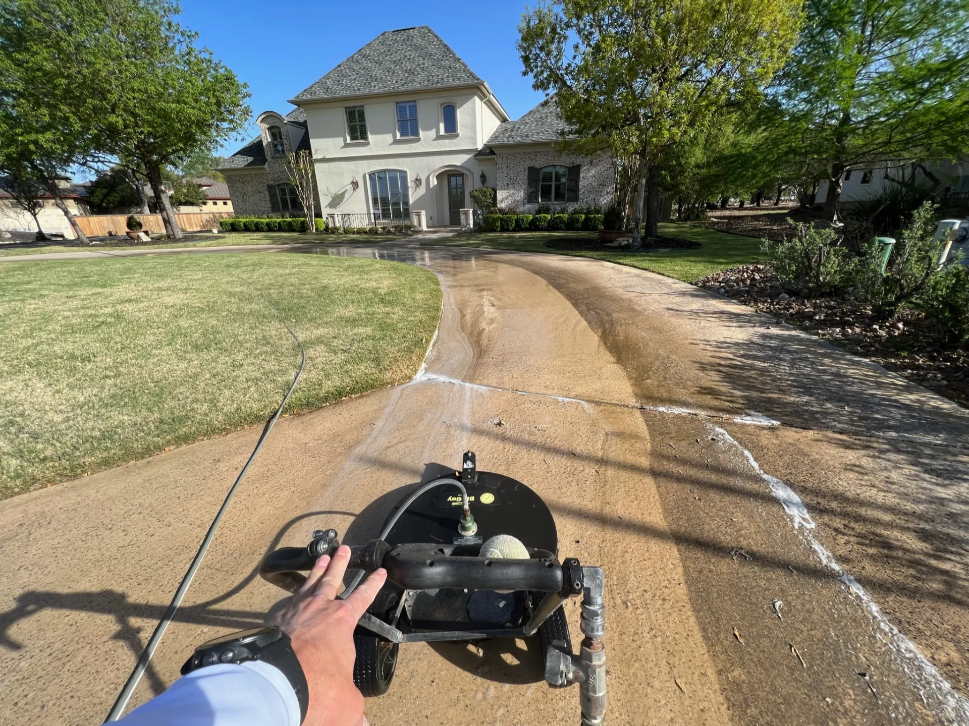 Texas Pure Clean surface cleaner restoring a Fair Oaks Ranch driveway
