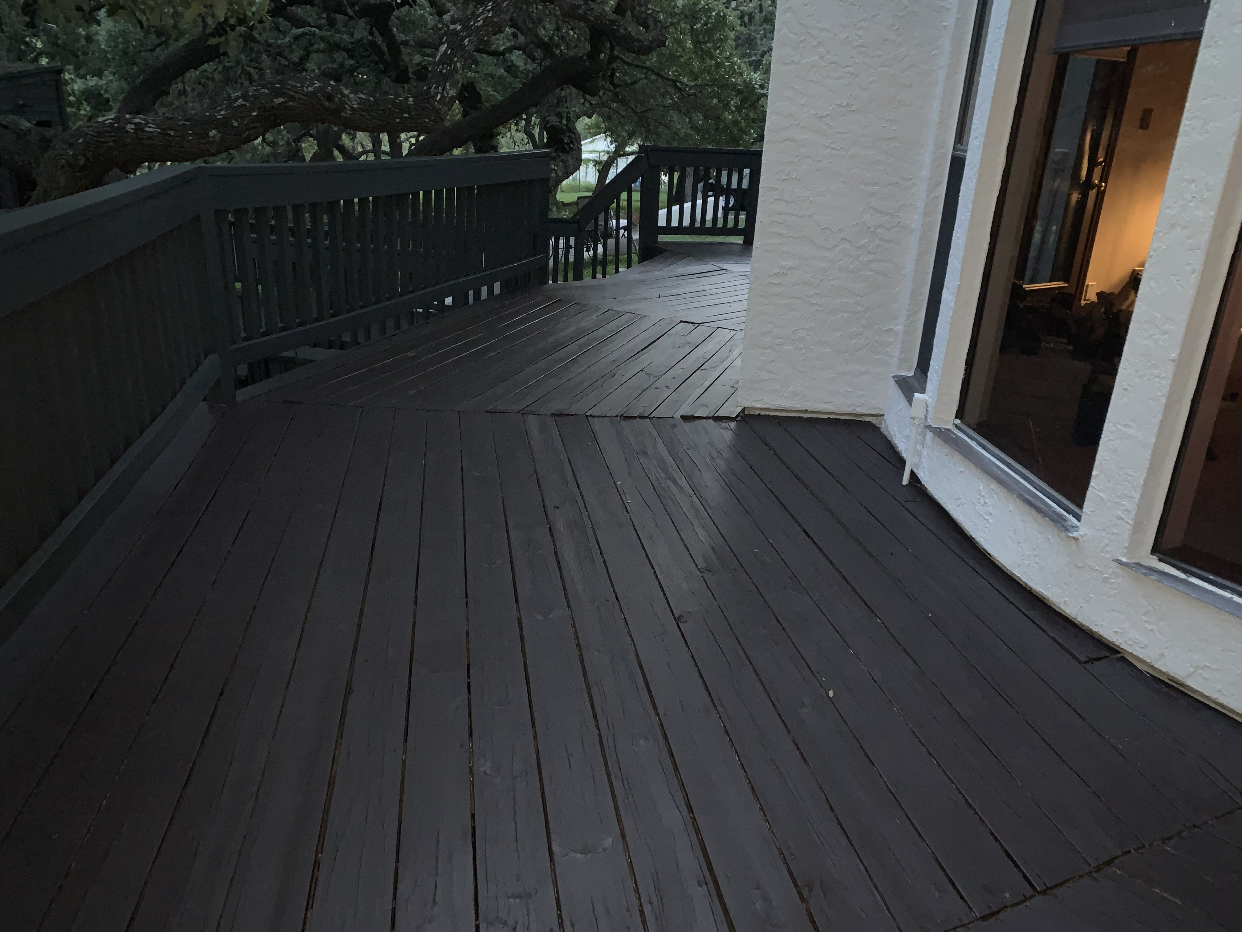 Same deck from a different angle after staining — clean lines, consistent color, and a finish that looks brand new