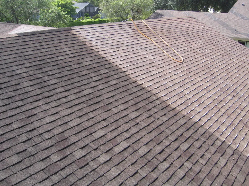 Asphalt shingle roof cleaning before-and-after example