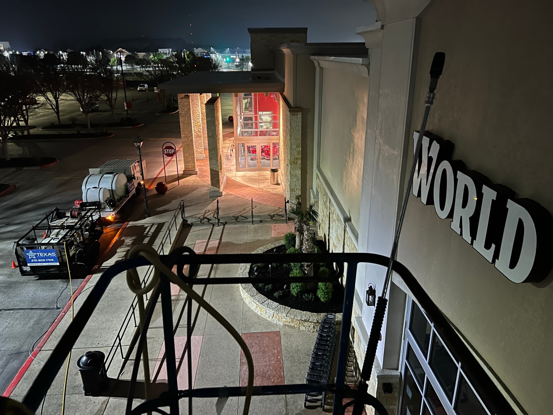 Texas Pure Clean truck rig cleaning World Market storefront at night