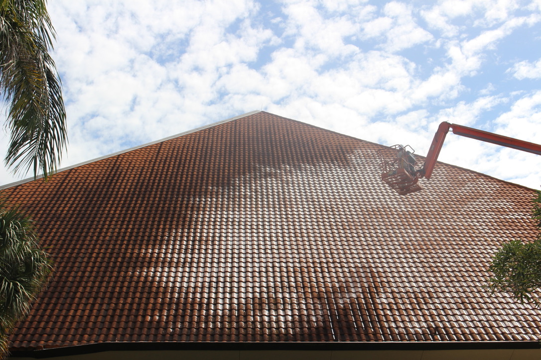Wide view of a commercial roof cleaning project