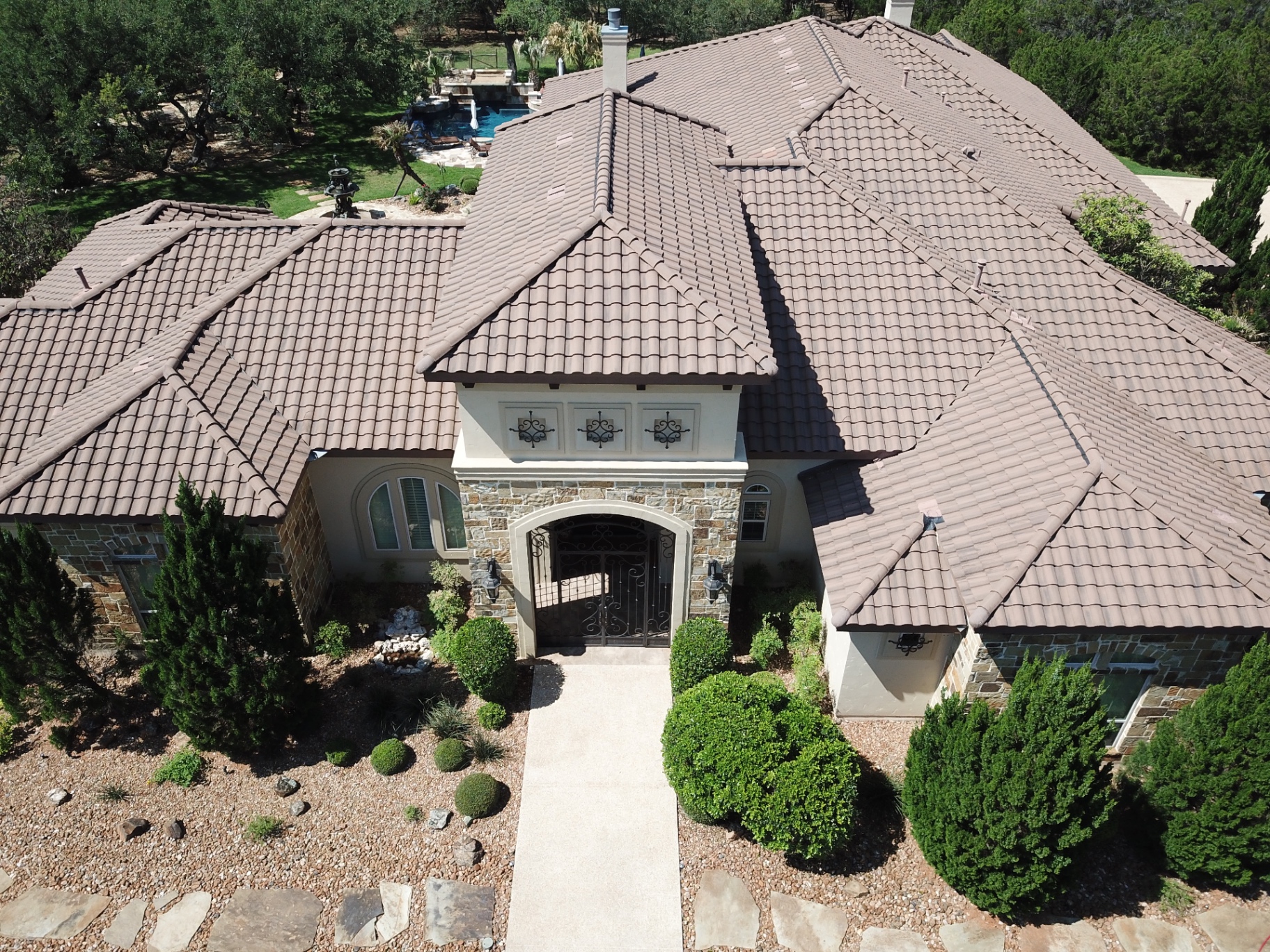 Same tile roof after a soft wash cleaning visit